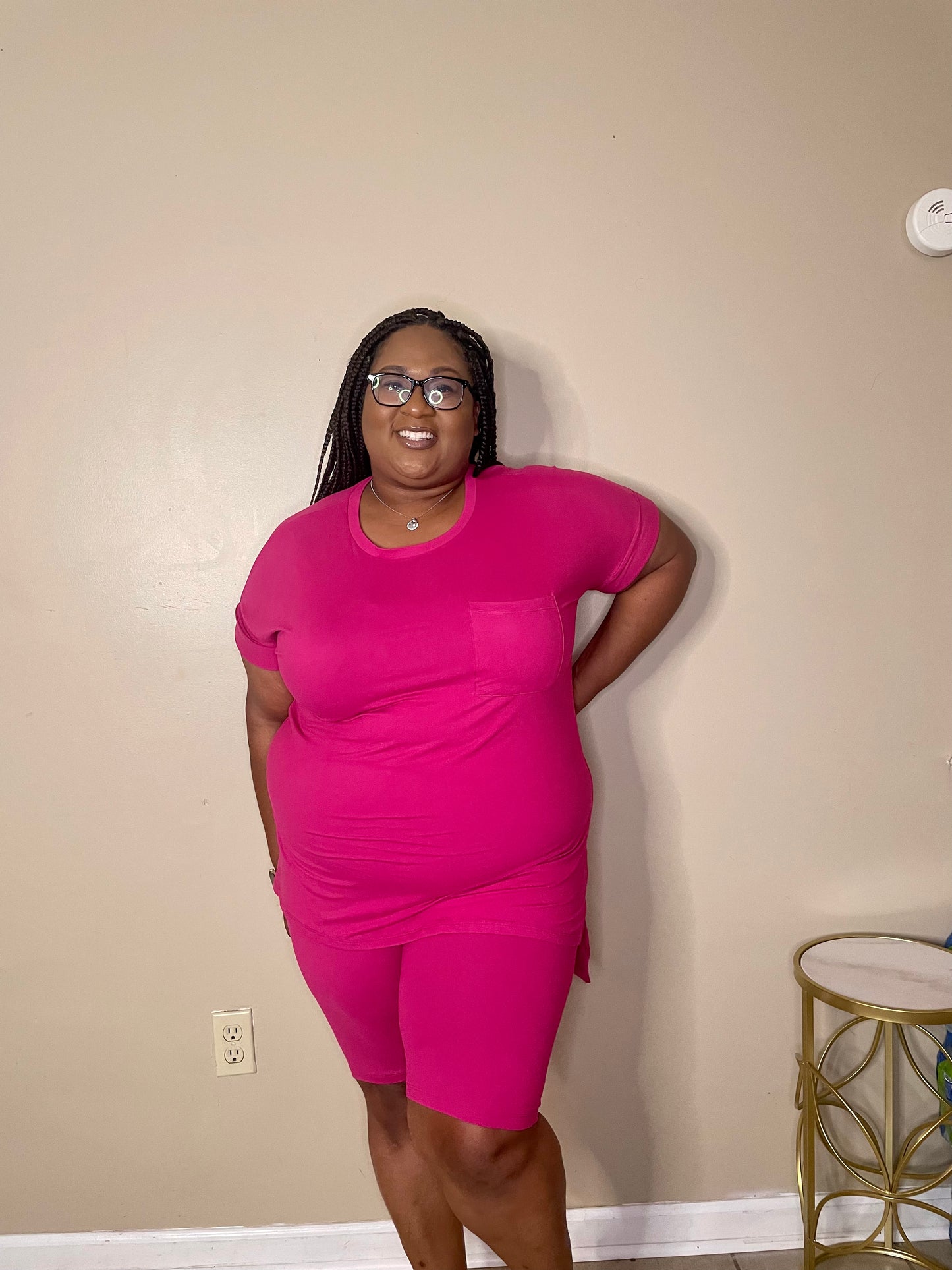 magenta oversized pocket t-shirt with knee length biker shorts